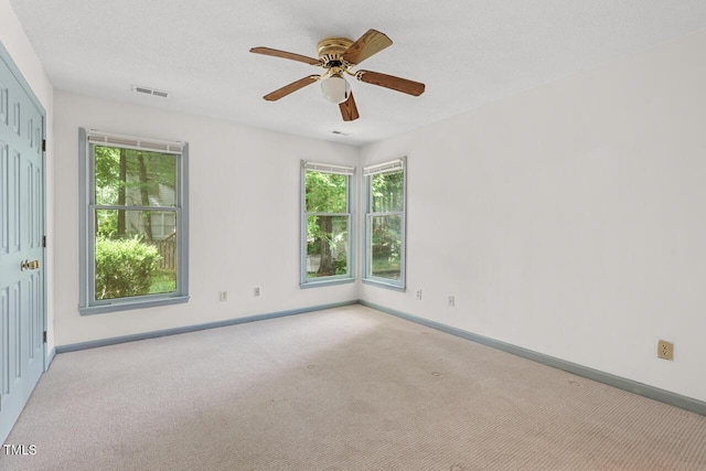 1014 Laurens Way, Knightdale, NC 27545 - carpeted empty room with baseboards and ceiling fan