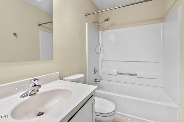 1014 Laurens Way, Knightdale, NC 27545 - bathroom featuring toilet, vanity, and bathing tub / shower combination