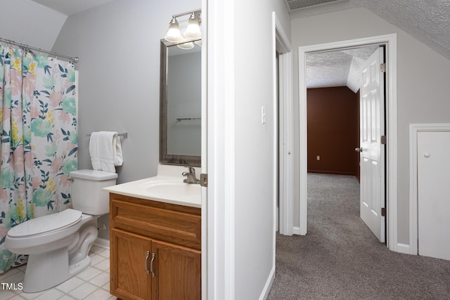 657 Lakeview Dr, Stem, NC 27581 - full bathroom with vanity, toilet, a textured ceiling, lofted ceiling, and a shower with shower curtain