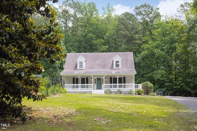 657 Lakeview Dr, Stem, NC 27581 - cape cod-style house featuring covered porch and a front yard