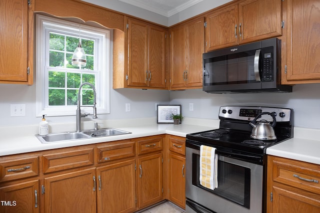 657 Lakeview Dr, Stem, NC 27581 - kitchen featuring stainless steel range with electric cooktop, a sink, brown cabinetry, and crown molding