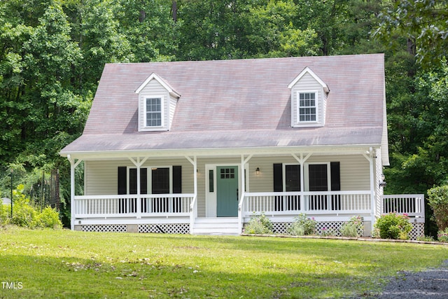 657 Lakeview Dr, Stem, NC 27581 - view of front facade with a porch and a front lawn
