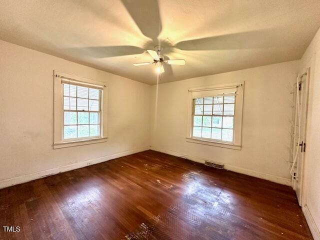 3810 Pendergrass St, Durham, NC 27704 - empty room featuring wood finished floors, baseboards, and ceiling fan