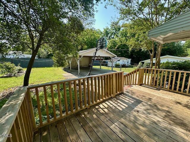 3810 Pendergrass St, Durham, NC 27704 - wooden terrace featuring view of scattered trees