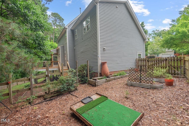 5 Providence Ridge Ln, Durham, NC 27713 - view of home's exterior with a garden