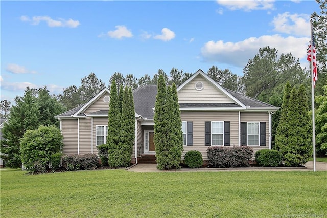 45 Remington Hills Dr, Bunnlevel, NC 28323 - view of front of property featuring a front yard and a shingled roof