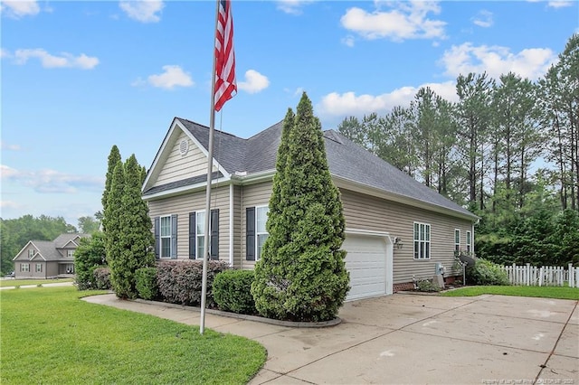 45 Remington Hills Dr, Bunnlevel, NC 28323 - view of home's exterior featuring a garage, concrete driveway, and roof with shingles