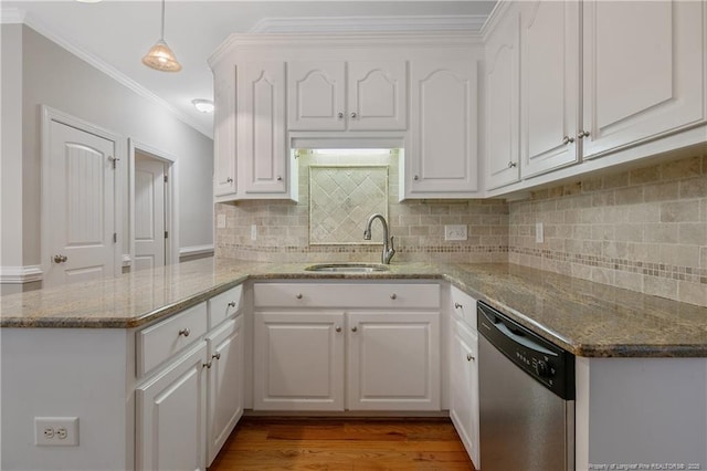 45 Remington Hills Dr, Bunnlevel, NC 28323 - kitchen featuring dishwasher, a sink, white cabinetry, backsplash, and crown molding