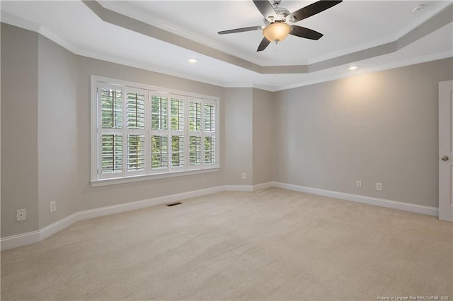 45 Remington Hills Dr, Bunnlevel, NC 28323 - spare room featuring a tray ceiling, crown molding, light colored carpet, recessed lighting, and ceiling fan