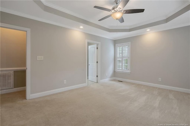 45 Remington Hills Dr, Bunnlevel, NC 28323 - unfurnished bedroom featuring a tray ceiling, carpet, crown molding, recessed lighting, and baseboards