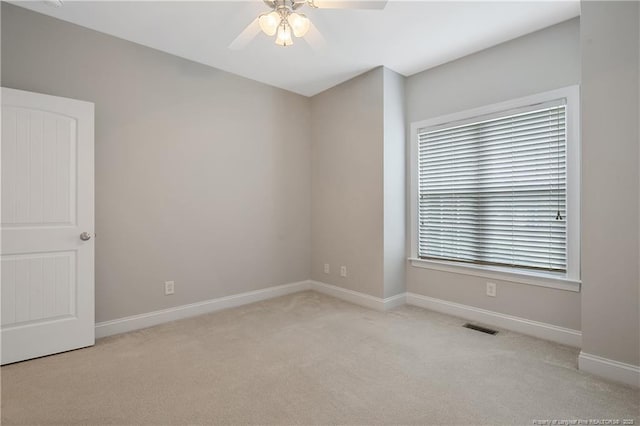 45 Remington Hills Dr, Bunnlevel, NC 28323 - spare room with ceiling fan, carpet floors, and baseboards