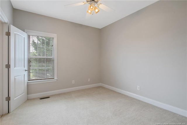 45 Remington Hills Dr, Bunnlevel, NC 28323 - spare room featuring light colored carpet, baseboards, and a ceiling fan