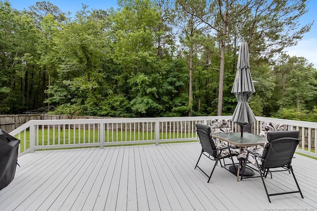 265 Tactical Dr, Bunnlevel, NC 28323 - wooden terrace with outdoor dining area