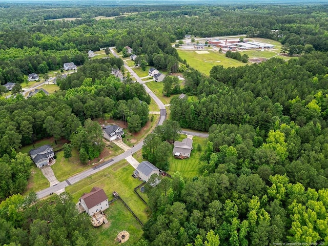 265 Tactical Dr, Bunnlevel, NC 28323 - aerial view of property and surrounding area featuring a forest