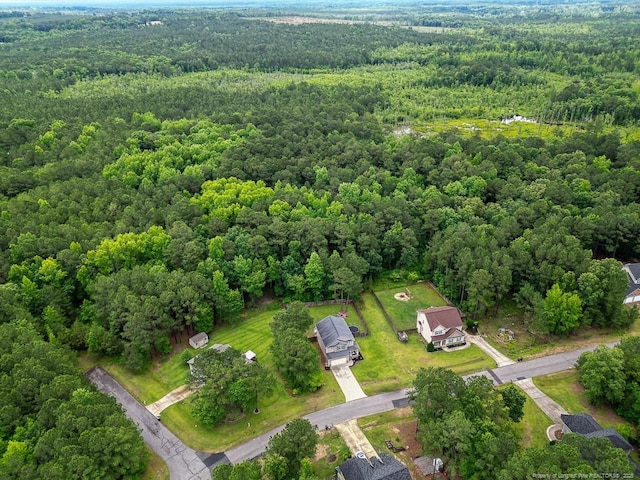 265 Tactical Dr, Bunnlevel, NC 28323 - aerial overview of property's location with a heavily wooded area