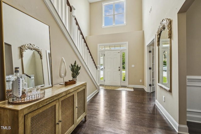 347 Country Mill Way, Fuquay Varina, NC 27526 - foyer entrance with hardwood / wood-style flooring, baseboards, stairs, and a towering ceiling