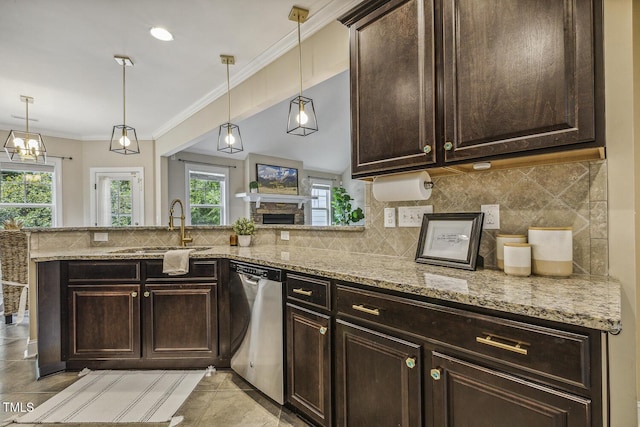 347 Country Mill Way, Fuquay Varina, NC 27526 - kitchen featuring stainless steel dishwasher, a sink, decorative backsplash, light stone counters, and ornamental molding