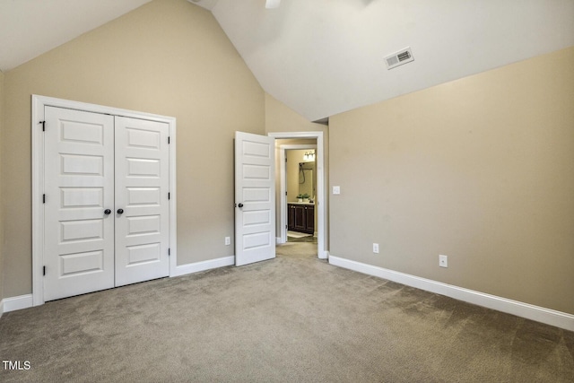 347 Country Mill Way, Fuquay Varina, NC 27526 - unfurnished bedroom with vaulted ceiling, carpet floors, a closet, and baseboards