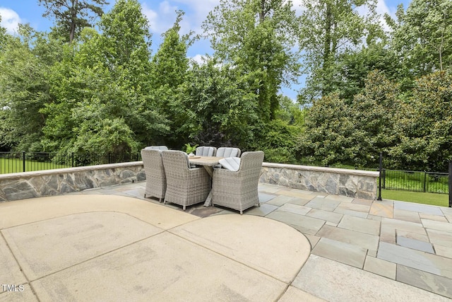 347 Country Mill Way, Fuquay Varina, NC 27526 - view of patio featuring outdoor dining area and view of wooded area
