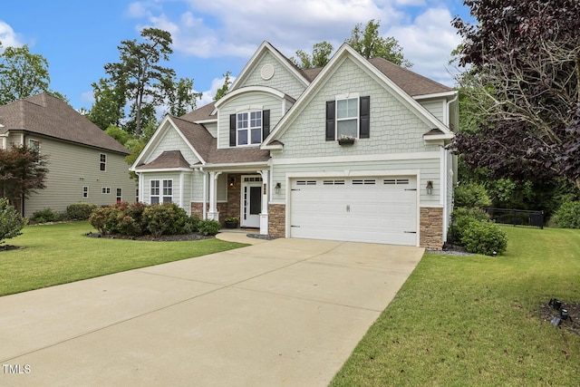 347 Country Mill Way, Fuquay Varina, NC 27526 - craftsman-style home featuring a garage, concrete driveway, stone siding, and a front yard
