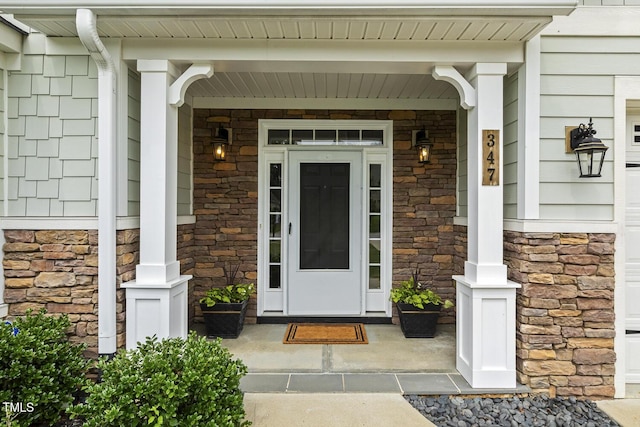 347 Country Mill Way, Fuquay Varina, NC 27526 - property entrance with a porch and stone siding