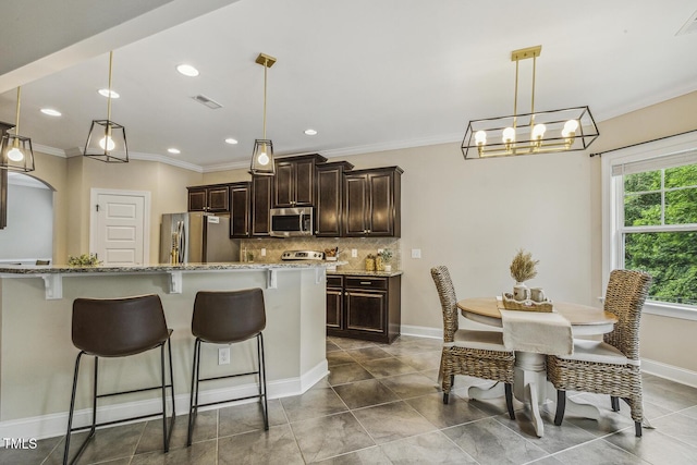 347 Country Mill Way, Fuquay Varina, NC 27526 - kitchen with stainless steel appliances, a breakfast bar area, crown molding, dark brown cabinetry, and recessed lighting