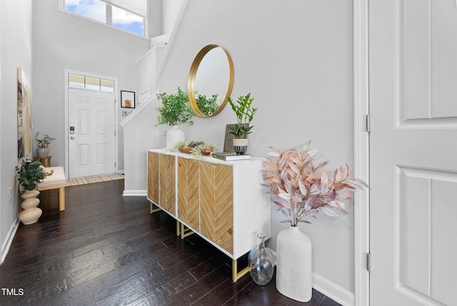 7807 Elmshire Way, Raleigh, NC 27616 - foyer featuring dark wood-type flooring, baseboards, and a high ceiling
