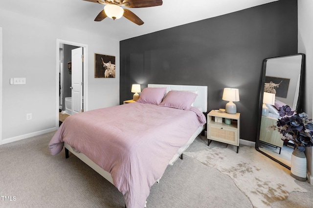 7807 Elmshire Way, Raleigh, NC 27616 - carpeted bedroom featuring baseboards, ceiling fan, and ensuite bathroom