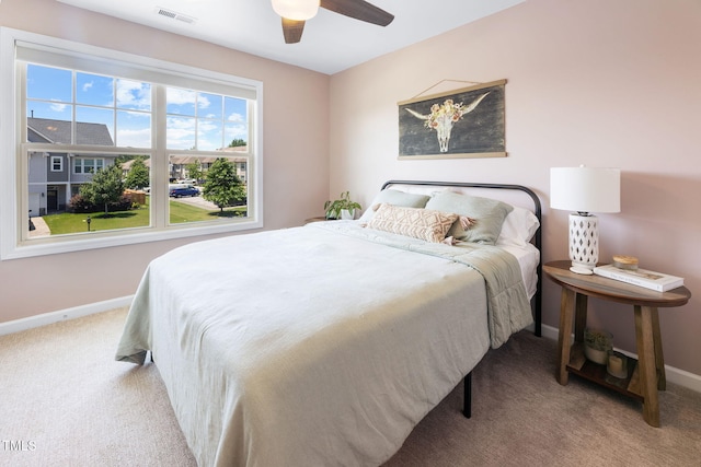 7807 Elmshire Way, Raleigh, NC 27616 - carpeted bedroom featuring baseboards and ceiling fan