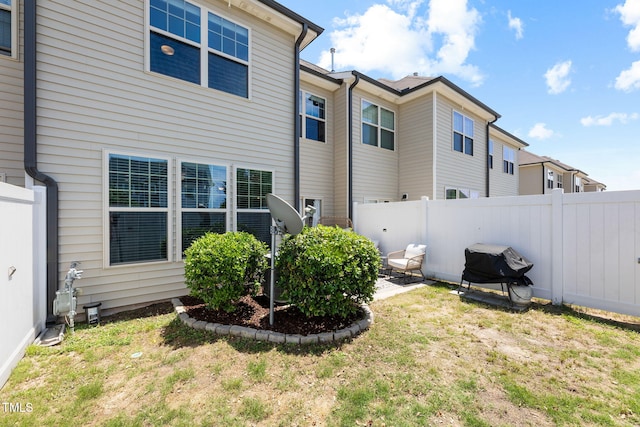 7807 Elmshire Way, Raleigh, NC 27616 - rear view of property with a patio