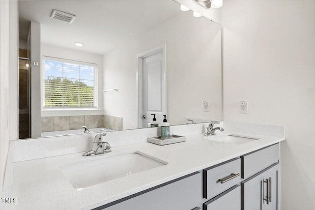 116 Hayfield Dr, Lillington, NC 27546 - full bathroom with double vanity and a bath