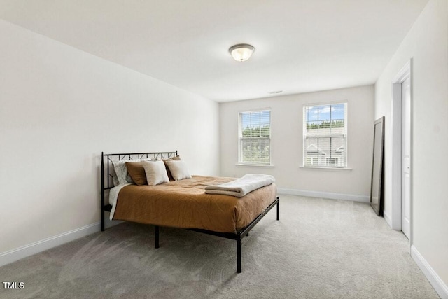 116 Hayfield Dr, Lillington, NC 27546 - bedroom with light carpet and baseboards