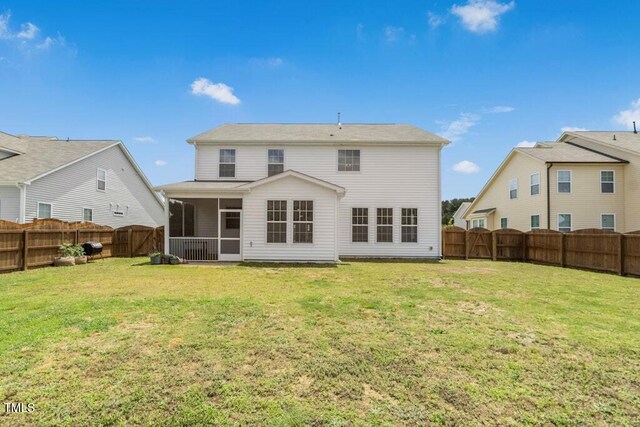 116 Hayfield Dr, Lillington, NC 27546 - back of house with a sunroom