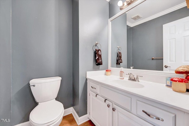 113 Fetzer Ct, Cary, NC 27513 - bathroom with vanity, toilet, and ornamental molding
