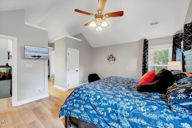 113 Fetzer Ct, Cary, NC 27513 - bedroom featuring lofted ceiling, wood finished floors, baseboards, and a ceiling fan