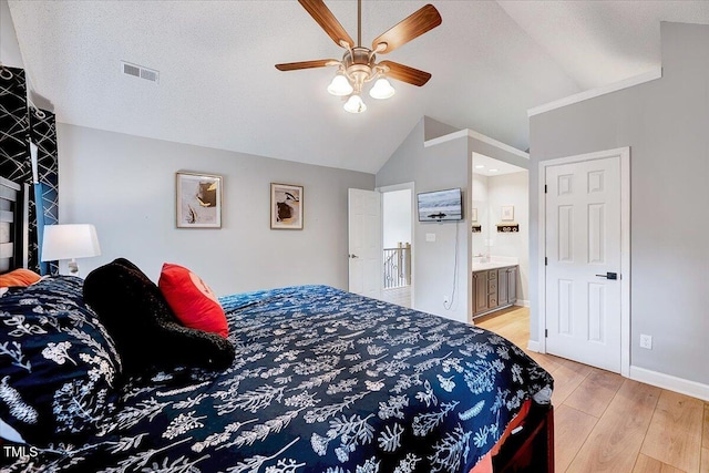 113 Fetzer Ct, Cary, NC 27513 - bedroom with lofted ceiling, light wood finished floors, baseboards, ensuite bathroom, and a ceiling fan