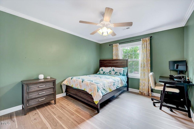 113 Fetzer Ct, Cary, NC 27513 - bedroom with a desk, baseboards, wood finished floors, crown molding, and ceiling fan