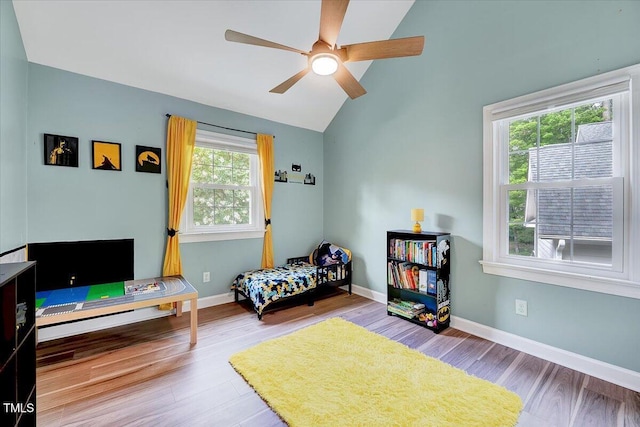 113 Fetzer Ct, Cary, NC 27513 - bedroom featuring wood finished floors, lofted ceiling, baseboards, and ceiling fan