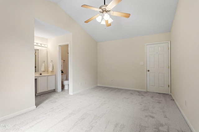 118 Setter Pt, Clayton, NC 27520 - unfurnished bedroom with light carpet, lofted ceiling, baseboards, ensuite bath, and a ceiling fan