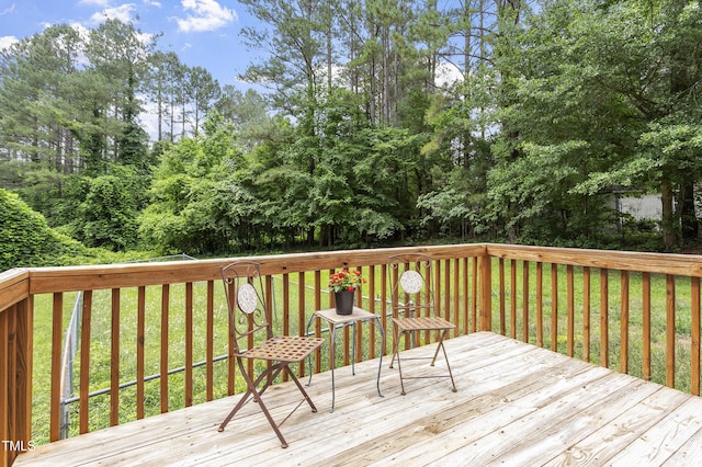 118 Setter Pt, Clayton, NC 27520 - deck with a lawn and view of scattered trees