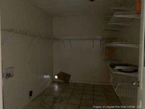 1813 Ashton Rd, Fayetteville, NC 28304 - laundry area featuring tile patterned floors