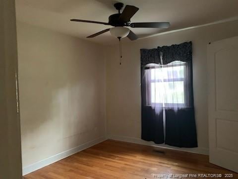 1813 Ashton Rd, Fayetteville, NC 28304 - unfurnished room with light wood-style flooring, baseboards, and ceiling fan