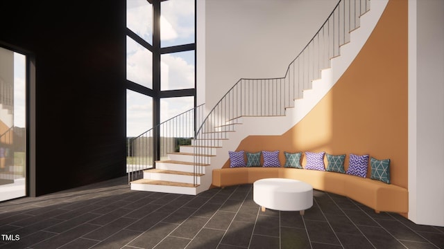 1021 Ferson, Apex, NC 27519 - staircase featuring tile patterned floors and a towering ceiling