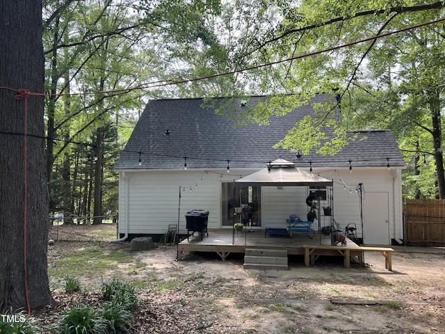 503 Pine Run, Knightdale, NC 27545 - back of property featuring a deck, roof with shingles, and a gazebo