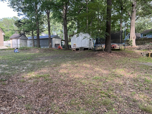 503 Pine Run, Knightdale, NC 27545 - view of yard featuring a trampoline
