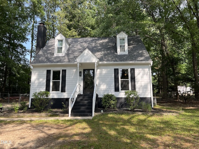 503 Pine Run, Knightdale, NC 27545 - cape cod home featuring a chimney and a shingled roof