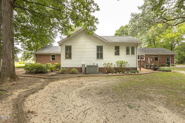 6517 Whitted Rd, Fuquay Varina, NC 27526 - back of property featuring central AC and crawl space