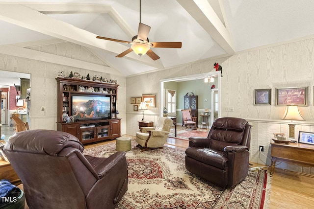 6517 Whitted Rd, Fuquay Varina, NC 27526 - living room featuring wood finished floors, a ceiling fan, lofted ceiling, and wood walls