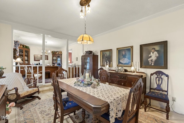 6517 Whitted Rd, Fuquay Varina, NC 27526 - dining area featuring ornamental molding and a chandelier