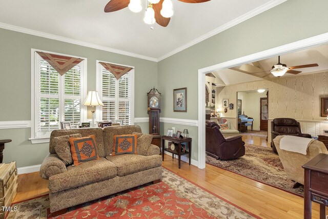 6517 Whitted Rd, Fuquay Varina, NC 27526 - living room with ceiling fan, wood finished floors, crown molding, and baseboards